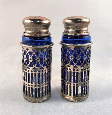 small metal salt and pepper shakers in blue box|cobalt salt and pepper shakers.